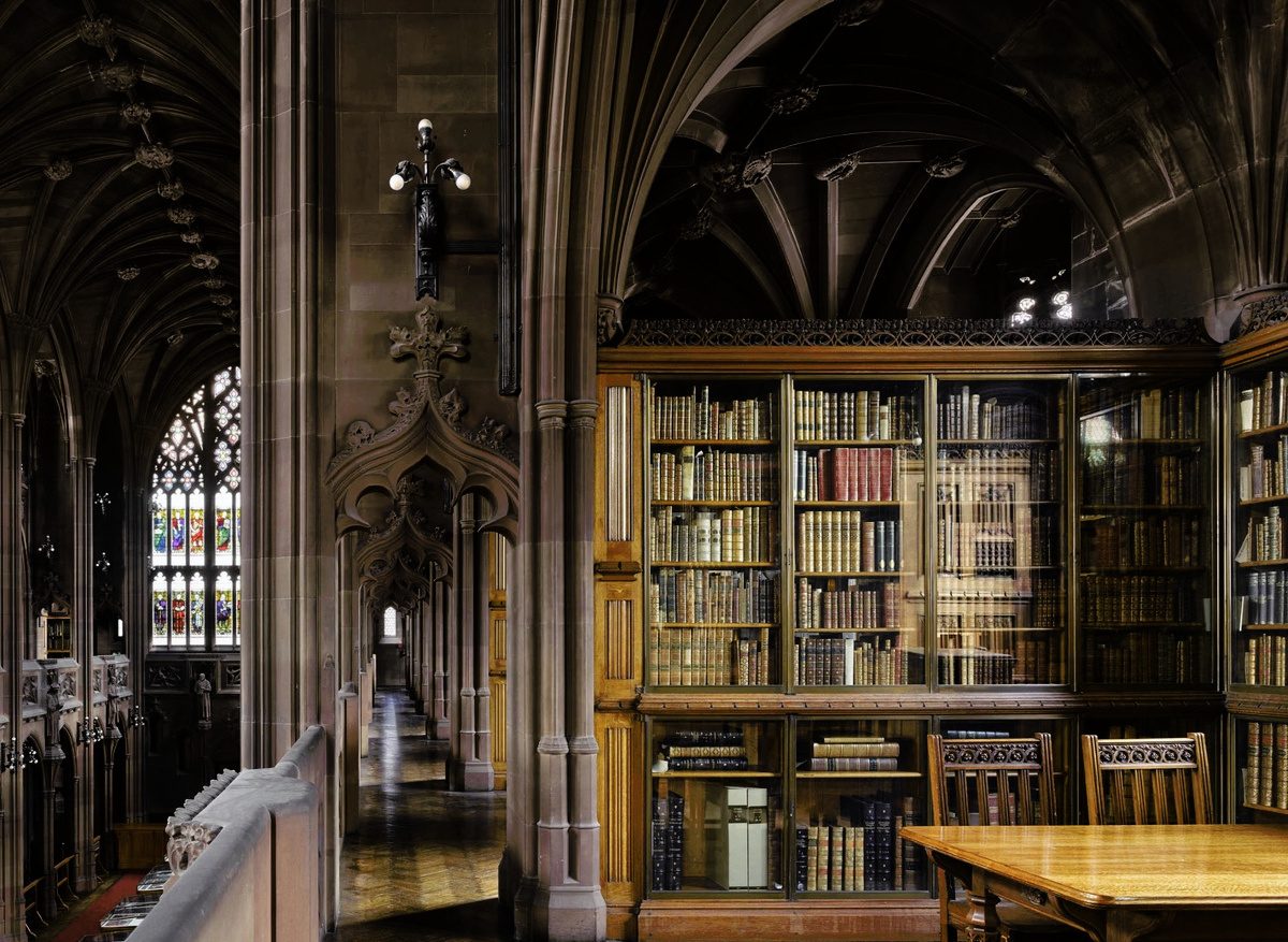 Oak cabinets, table and chairs in the John Rylands Library